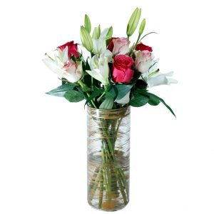 Ignite passion v-007 Lilies 3 Fuschia pink rose 4 Pink rose 3 Vase: Printer cylinder vase